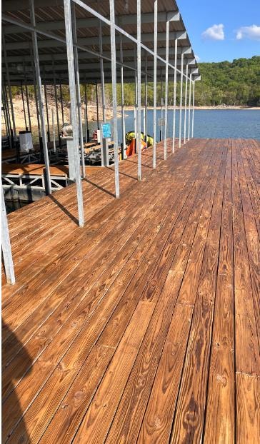 Freshly stained dock boards after restoration