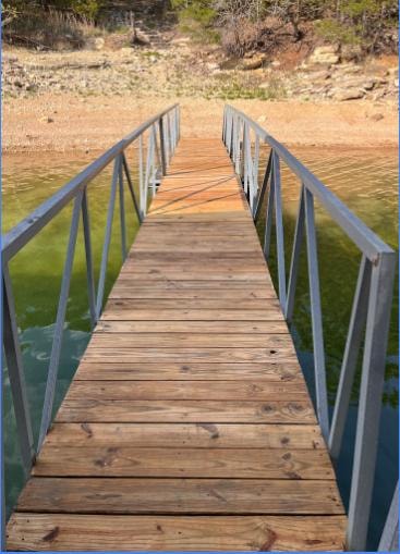 Clean wooden dock walkway over the water
