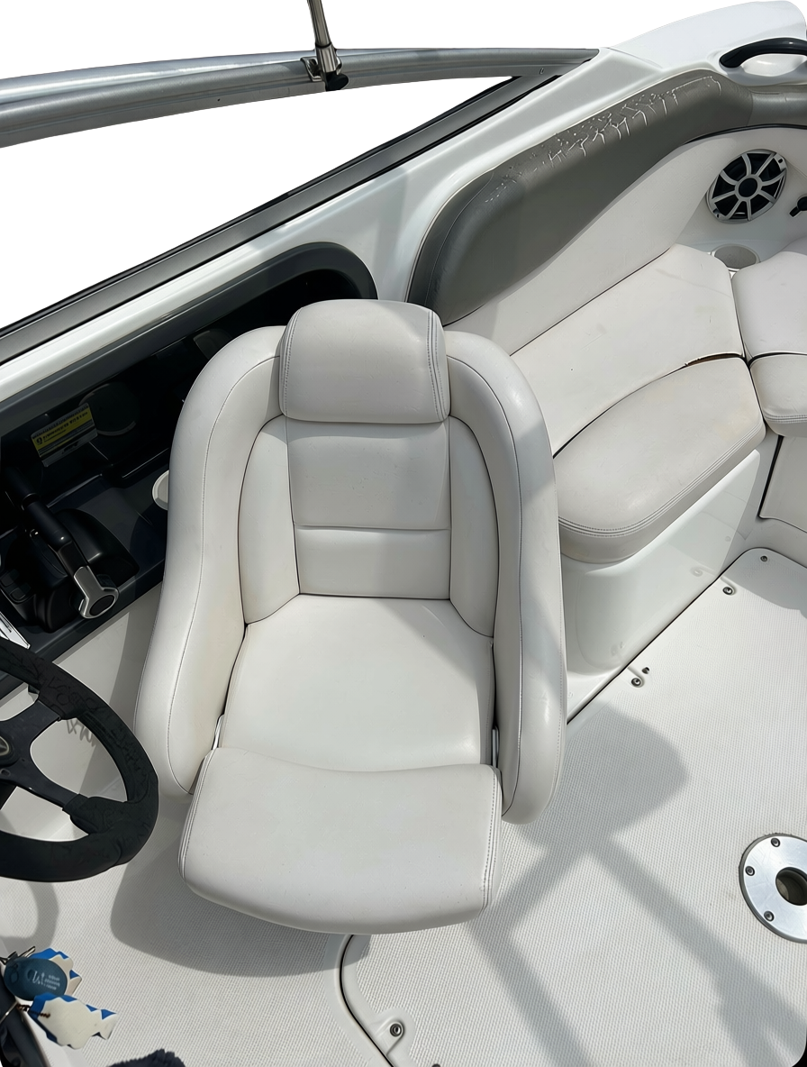 Clean boat interior with white leather seats